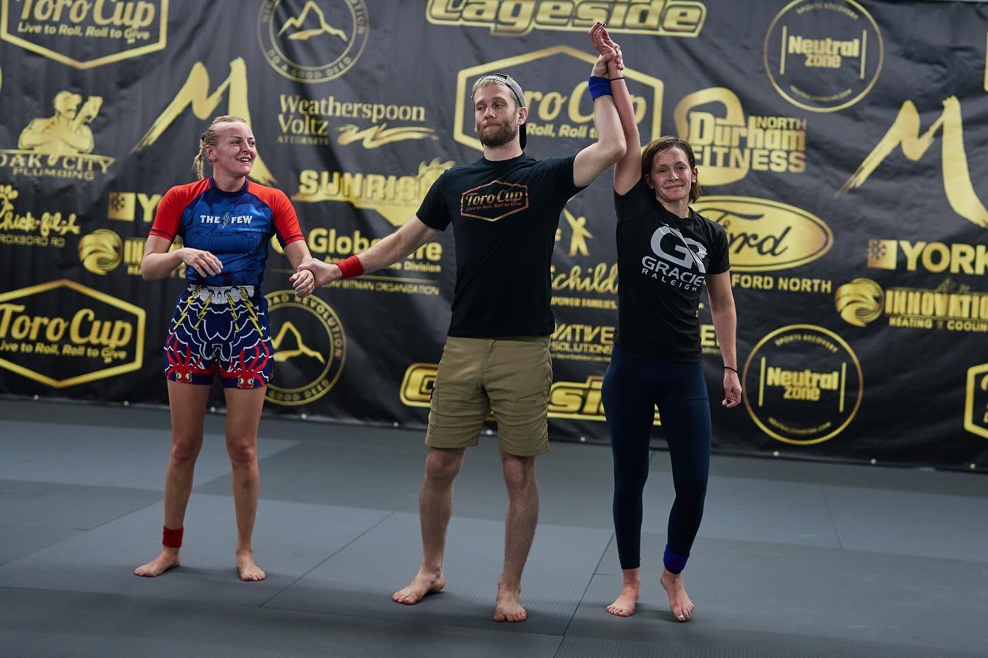 Gracie Raleigh competitor Maggie Edwards has her hand raised in victory at the Toro Cup Brazilian Jiu-Jitsu tournament