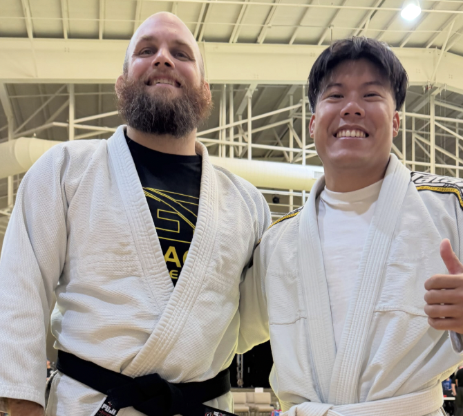 Gracie Raleigh BJJ student Paul with coach Karl Krebs after his first judo tournament win at ATJA Nationals