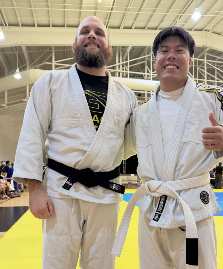 Gracie Raleigh BJJ student Paul with coach Karl Krebs after his first judo tournament win at ATJA Nationals